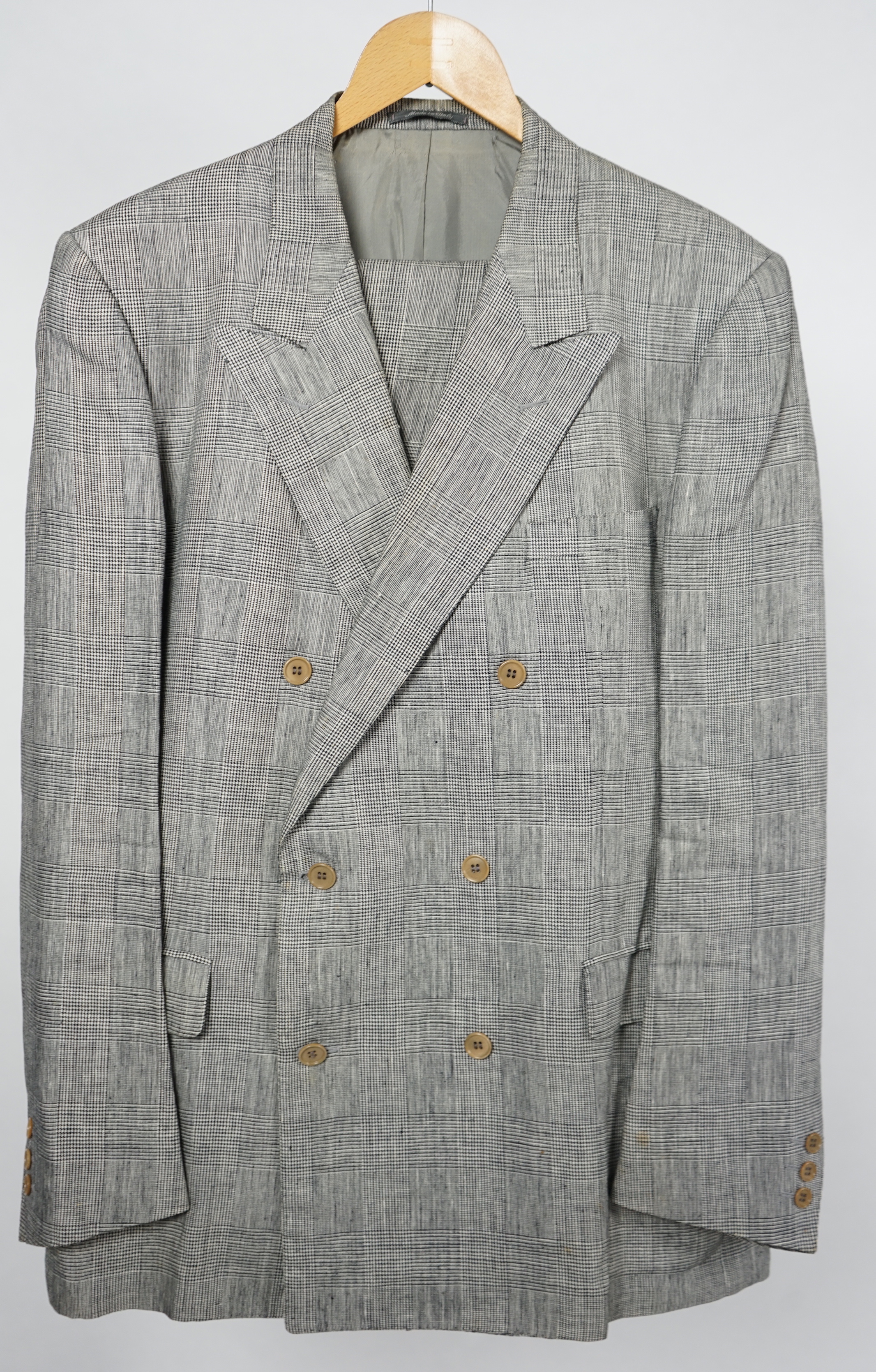 A Saint Laurent rive gauche gentlemen's Prince of Wales check double breasted linen suit, approx size 42